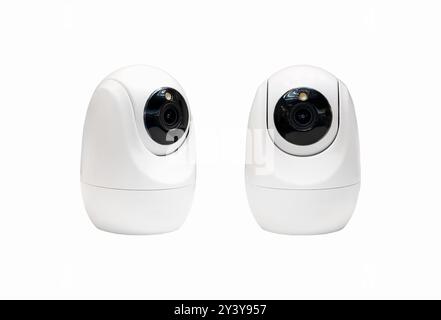 Isolated indoors smart security camera. Surveillance cameras. Stock Photo