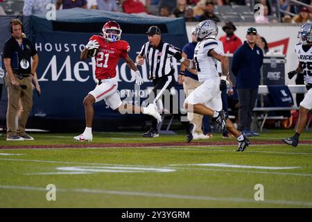 Houston, USA. 14th Sep, 2024. Houston Cougars running back STACY SNEED (21) runs for a 65 yard touchdown in the first half during the game between the Rice Owls and the Houston Cougars on September 14, 2024 at TDECU Stadium in Houston, Texas. The Houston Cougars defeated the Rice Owls 33-7. (Photo by: Jerome Hicks/Sipa USA) Credit: Sipa USA/Alamy Live News Stock Photo