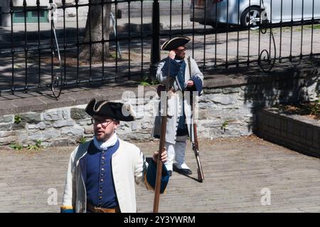 Quebec city, Canada. July 7, 2019. Men dressed up in revolutionary  war clothes reenactment in the old area of quebec city in Canada. Stock Photo