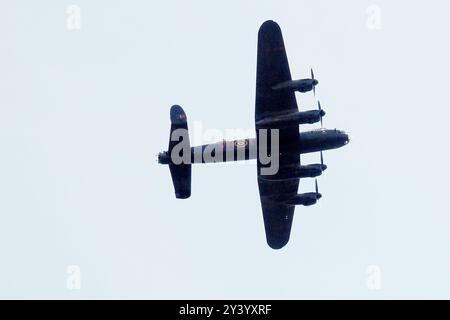 London, UK. 15th Sept 2024. A Lancaster bomber flies low over central London with the Battle of Britain Thanksgiving Service at Westminster Abbey. Credit: matthew Chattle/Alamy Live News Stock Photo