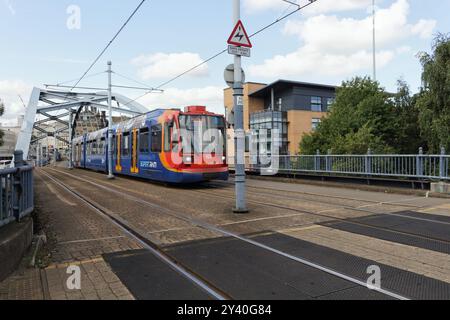 Park Square Bridge in Sheffield city centre, England UK, with Supertram Metro, Urban Transport light rail network tram Stock Photo