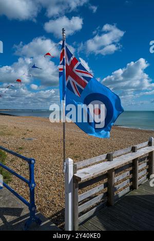 Royl Air Force Ensign (Flag) flying in a breeze on the beach at Eastbourne Stock Photo