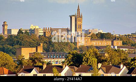 Glasgow, Scotland, UK.15th September, 2024. UK Weather:  Sunny weather returns over the south of the city as a promise of more awaits. Glasgow university gothic tower  and gartnavel hospital in the leafy affluent west end.  Credit Gerard Ferry/Alamy Live News Stock Photo