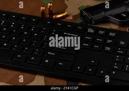 Computer keyboard and handcuffs. Cybercrime, internet security and crime concept. Stock Photo