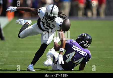 Baltimore, Maryland, on Sunday, September 15, 2024. Baltimore, United States. 15th Sep, 2024. Baltimore Ravens cornerback Marlon Humphrey (44) is called for pass interference against Las Vegas Raiders wide receiver Davante Adams (17) during the first half of the Ravens' home opener game at M&T Bank Stadium in Baltimore, Maryland, on Sunday, September 15, 2024. Photo by David Tulis/UPI Credit: UPI/Alamy Live News Credit: UPI/Alamy Live News Stock Photo