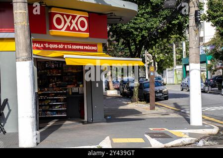 Sao Paulo, Brazil, March 15 2023. Front view of Oxxo supermarket in Sao Paulo city. Oxxo is popular Mexican chain of grocery stores or convenience sto Stock Photo