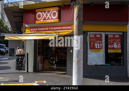 Sao Paulo, Brazil, March 15 2023. Front view of Oxxo supermarket in Sao Paulo city. Oxxo is popular Mexican chain of grocery stores or convenience sto Stock Photo