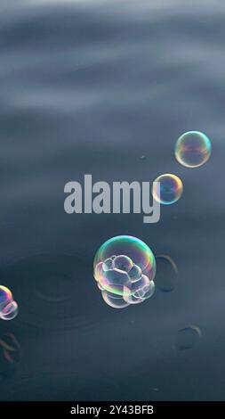 SOAP BUBBLES ON WATER Stock Photo