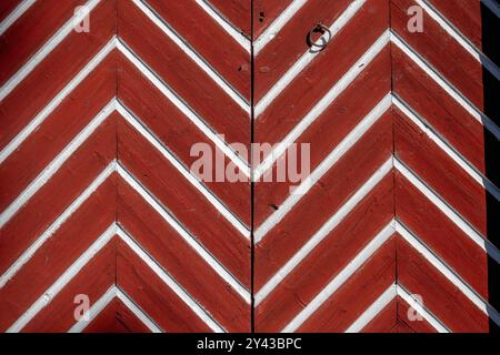 old door boards painted red and white, texture pattern background Stock Photo