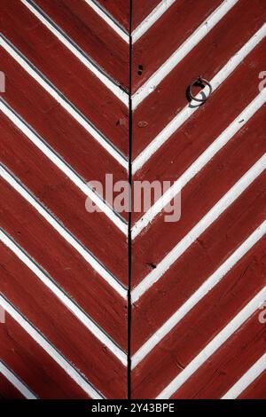 old door boards painted red and white, texture pattern background Stock Photo
