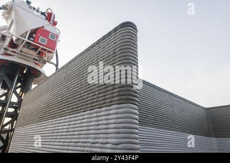 modern construction of 3D houses. printed house using a 3D printer. innovative construction technologies Stock Photo