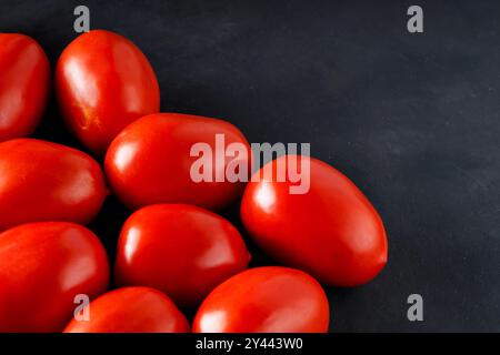 Red Tomatoes on Dark Background, Farm-to-Table Fresh Vegetables Stock Photo