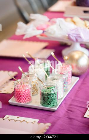 Christmas sprinkles for decorations on table Stock Photo