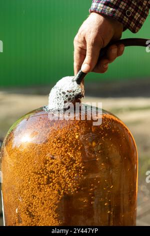 Large water bottle. Liquid canister. Large size plastic bootlock. Stock Photo