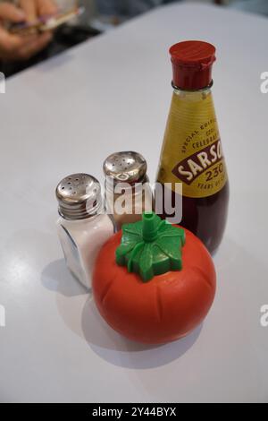 traditional Condiments inside a Fish and Chip shop in London Stock Photo