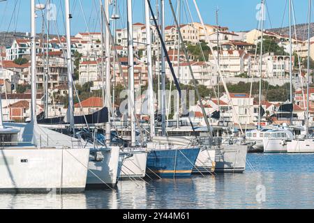 Luxury yachts are reflecting on the calm waters of the marina in Rogoznica, Croatia, a popular tourist destination Stock Photo