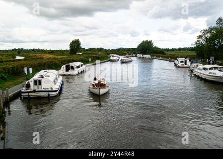 Leisure craft on River Ant viewed from Ludlam Bridge Norfolk Broads Norfolk England UK Stock Photo