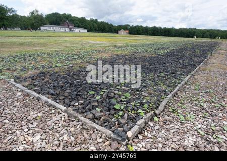 Footprint of the former barracks at the Buchenwald Concentration Camp. Gatehouse and former canteen building in background Stock Photo