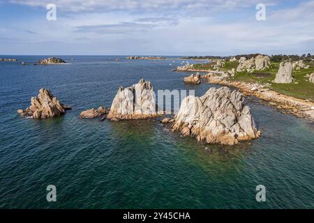 Natural landscape of the rocky beach and seascape along the Brittany coastline, Côte de granite rose or Pink Granite Coast in France Stock Photo