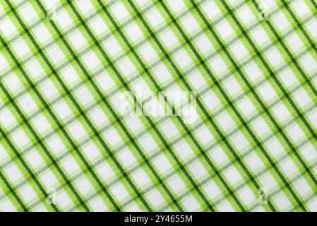 Checkered green fabric. Textile. Checkered fabric background with red and white cells Stock Photo