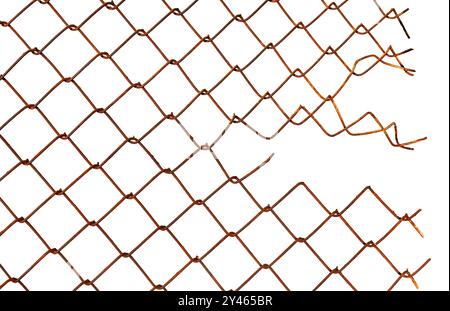 The texture of the metal mesh on a white background. Rusty Torn steel, metal mesh with holes Stock Photo