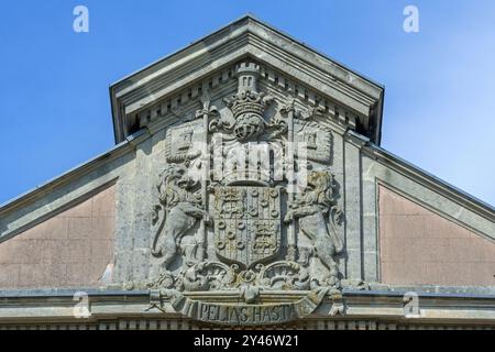 High relief coat of arms of 1750 Poeke Castle / Kasteel van Poeke in Rococo style near Aalter, East Flanders, Belgium Stock Photo