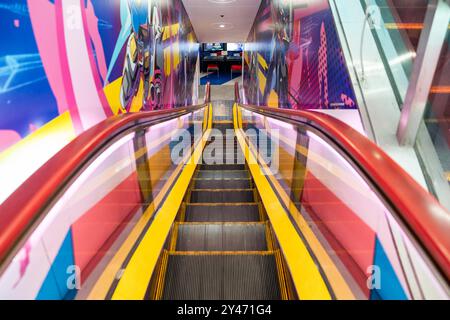 Tokyo, Japan-august 5, 2024:escalators of an arcade in Tokyo's Akihabara district on a sunny day Stock Photo