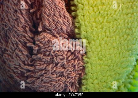 Macro photography of colored fabrics through glass. Wallpaper. Stock Photo