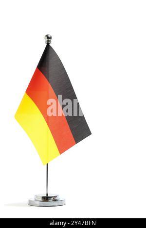 German flag on small flagpole, highlighted on white background Stock Photo