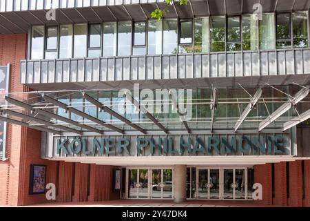 COLOGNE, GERMANY - MAY 31, 2024: Front entrance of the Kölner Philharmonie, a modern concert hall with glass and metal architecture Stock Photo