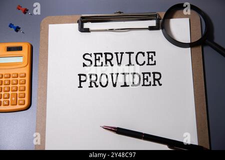 Service provider symbol. Concept words Service provider on wooden blocks on a beautiful grey table grey background. Businessman hand. Business service Stock Photo