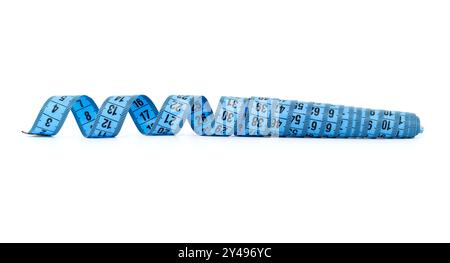 Close-up of a blue measuring tape isolated on a white background, displaying measurements in numbers. Ideal for fitness, sewing, and weight loss conce Stock Photo