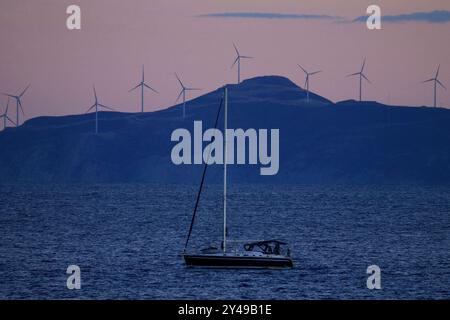 Windmill on uninhabited island  in  Greece Stock Photo
