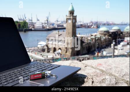 Airbnb Key with Notebook at Hamburg Harbor - Elbe View Stock Photo