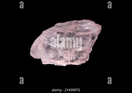 Closeup natural rough Morganite (rose beryl) gemstone on dark background. Stock Photo