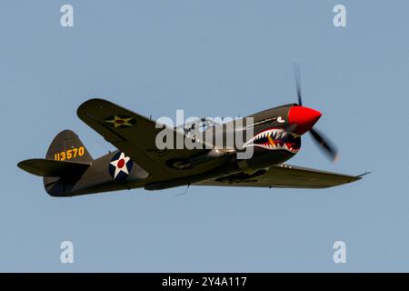 Melun Villaroche, France. 15th Sep, 2024. A Curtiss P-40 Warhawk in flight on September 15, 2024 in Melun-Villaroche airport. The Air legend airshow is an event that takes place every year, during the second weekend of September, at the Melun-Villaroche aerodrome, 40 km south-east of Paris, France. This exceptional show presents flight displays of legendary aircraft, which are rarely or have never been seen in France. Photo by Denis Prezat/ABACAPRESS.COM Credit: Abaca Press/Alamy Live News Stock Photo