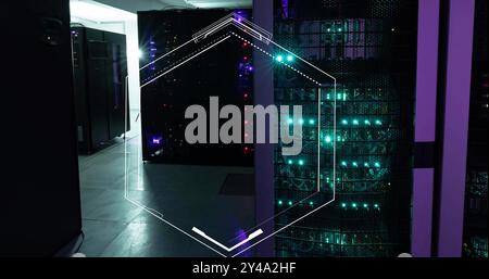 Image of hexagonal scanner frame over glowing computer servers in server room Stock Photo
