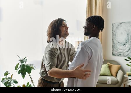 Two men share a joyful embrace in a bright and inviting living room filled with plants. Stock Photo