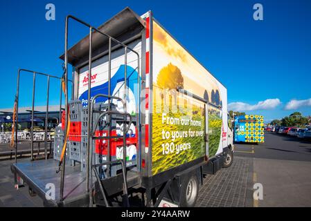 A close up of the rear of an Anchor milk delivery truck parked near a supermarket close to Auckland in New Zealand Stock Photo