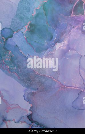 Abstract watercolor artwork featuring soft blues and purples with golden accents creating a soothing and elegant ambience Stock Photo