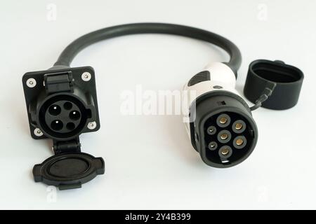 Type 1 to Type 2 EV charging cable adapter cutout isolated on white background Stock Photo