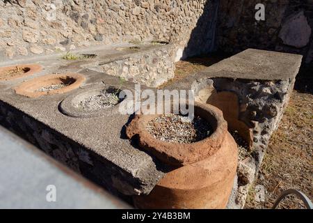 Ancient roman kitchen in the ancient city of Pompeii, Italy, Europe Stock Photo