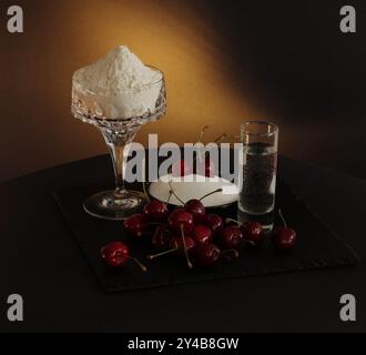 Cherries, flour, and sugar arranged for making traditional Ukrainian dumplings. Stock Photo