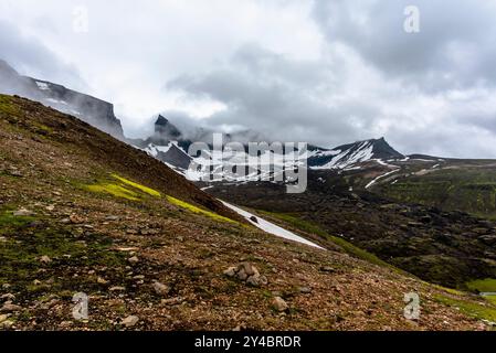 cloud-shrouded mountains around Borgarfjordur Eystri in Eastern Iceland Stock Photo