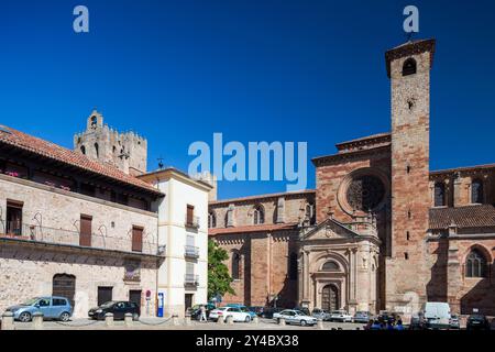 Visitors admire the stunning Cathedral and vibrant Plaza Mayor in Sigüenza, a historical gem in Guadalajara, Castile-La Mancha. Stock Photo