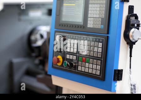 CNC control panel of industrial metalworking turning machine. Selective focus. Stock Photo
