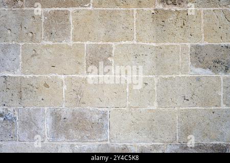 Background made from a wall of large old natural stones Stock Photo