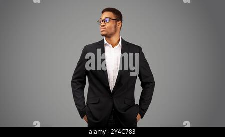 Afro man with hands in his pockets Stock Photo