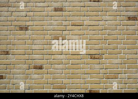 Background made from a wall of beige clinker bricks Stock Photo
