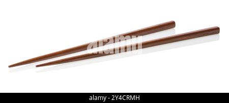 Two wooden chopsticks isolated on a white background Stock Photo